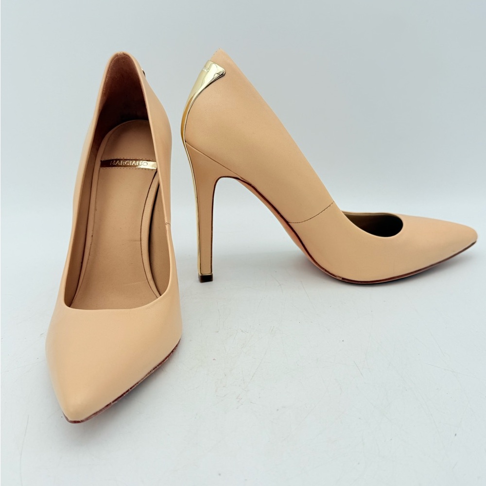 MARCIANO nude pointed-toe stiletto pumps with a gold-tone accent on the heel